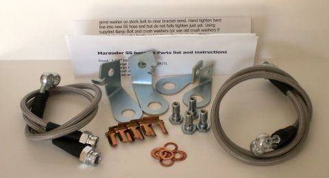 2003 Ford Crown Victoria - Marauder stainless steel brake hose kit laid out with mounting brackets, banjo bolts, copper washers, and printed instructions.
