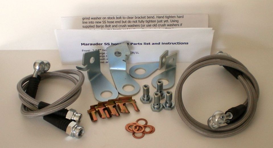 Stainless brake hose kit with brackets, banjo bolts, washers, and instructions