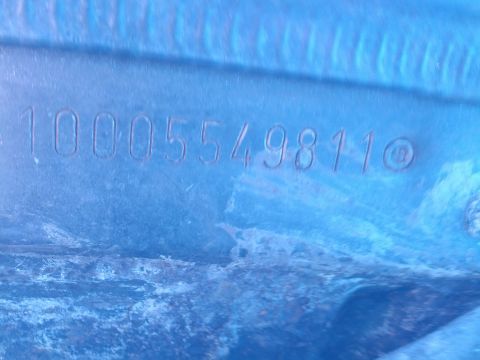 1989 BMW 3 Series - Stamped numbers on a blue metal surface, possibly a part number.