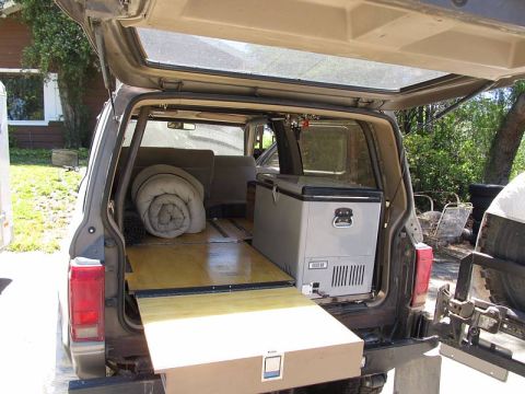 1990 Ford Bronco II - Drawer extends to provide a sleep platform. It's mounted on 500 lb rated Accuride drawer slides, plenty sturdy enough to sit on the end of…