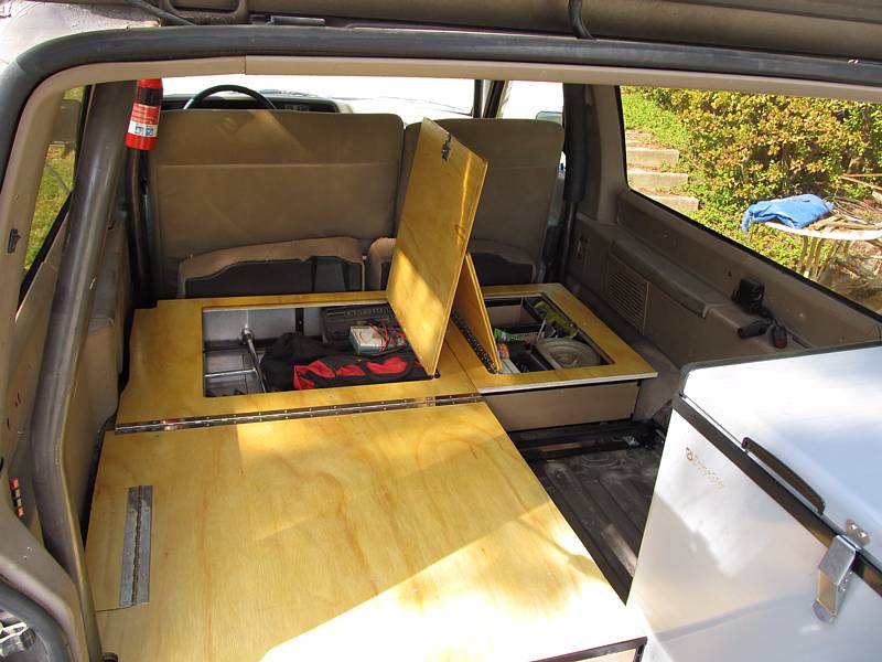 Two storage boxes built into the floor for lesser-used items (tools, vehicle recovery gear, extra fluids, etc.).