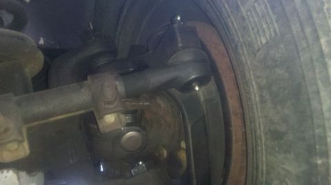 1997 Dodge 3500 - Underside view of steering linkage and suspension parts, likely from a truck.