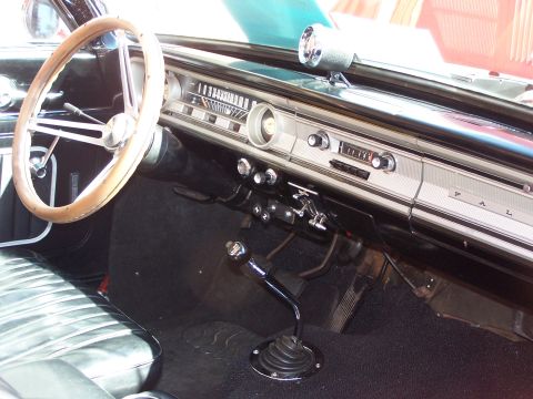 1971 Ford Ranchero - The dashboard features a horizontal speedometer and various knobs and buttons for controls.