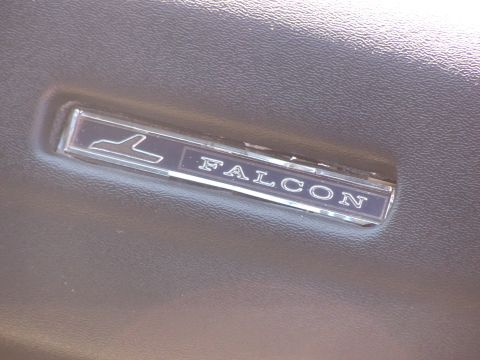 1971 Ford Ranchero - Close-up of a 'Falcon' emblem, indicating a Ford Falcon model, not a Ranchero.