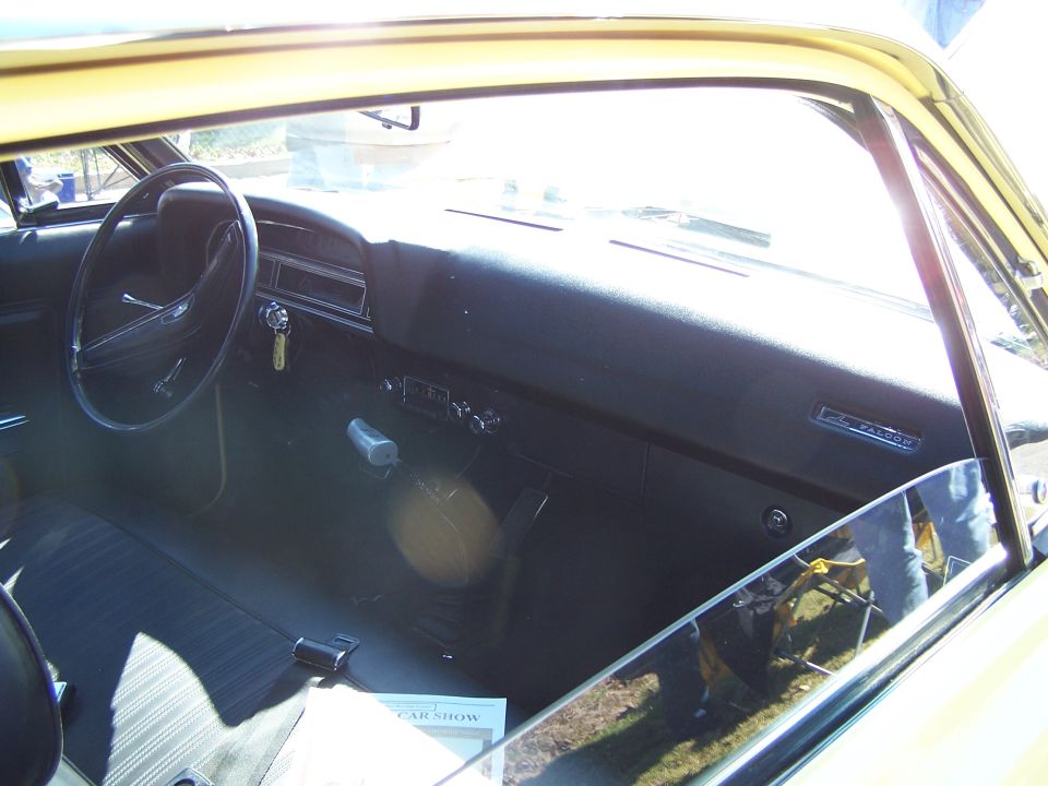1971 Ford Ranchero interior showing dashboard, steering wheel, and seat