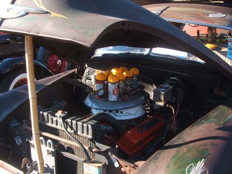 1971 Ford Ranchero - The engine bay features a V8 with a custom carburetor setup and a bamboo hood support.