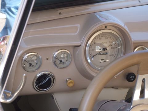 1971 Ford Ranchero - Close-up of a vehicle's dashboard a speedometer and auxiliary gauges.