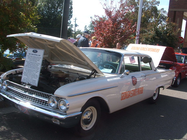 White 1960 Ford Patrol Car with hood and trunk open, Georgia State Patrol markings