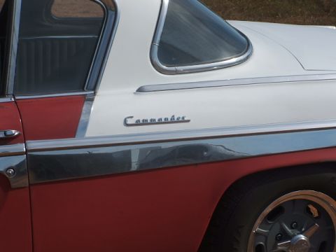 1971 Ford Ranchero - Detail of a two-tone vehicle chrome trim and "Commander" badging on the side panel.