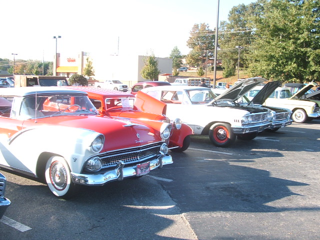 Red and white 1956 Ford Fairlane Crown Victoria front view