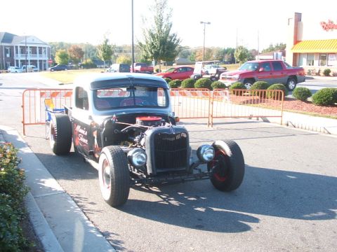 1971 Ford Ranchero - Custom hot rod pickup truck parked outdoors with the hood open.