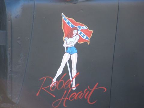 1971 Ford Ranchero - Artwork of a woman holding a confederate flag with the text "Rebel Heart" is visible on a dark surface.