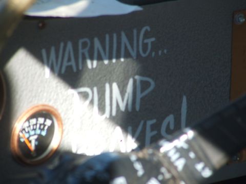 1971 Ford Ranchero - Handwritten warning message on the dashboard next to a gauge.