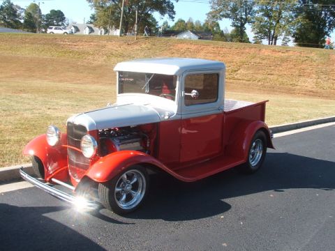 1971 Ford Ranchero - Custom hot rod pickup truck with two-tone paint and chrome wheels.
