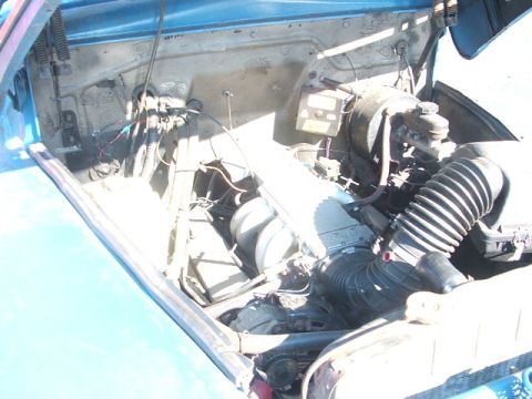 1971 Ford Ranchero - Close-up view of the engine compartment, showing the air intake and brake booster assembly.