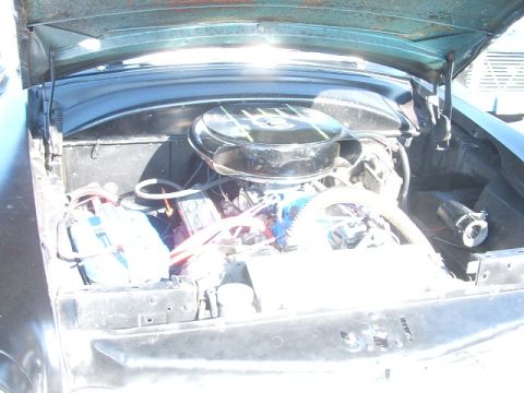 1971 Ford Ranchero - Engine bay of a classic car, showing the V8 engine and components.