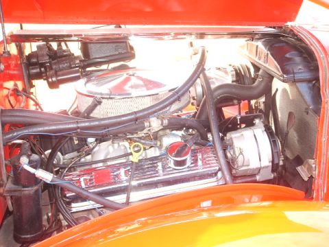 1971 Ford Ranchero - Close-up view of the engine compartment, highlighting chrome components and wiring.