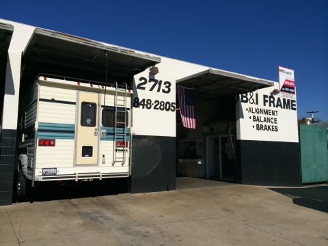 1997 Dodge 3500 - Camper shell on truck at B&I Frame, which offers alignment, balance, and brakes.
