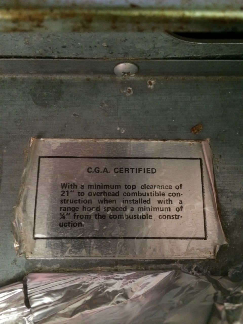 Label with text about C.G.A. certification and installation clearances