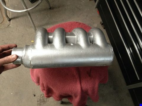 2002 Volkswagen Jetta - Close-up of an aluminum intake manifold, likely a replacement part.