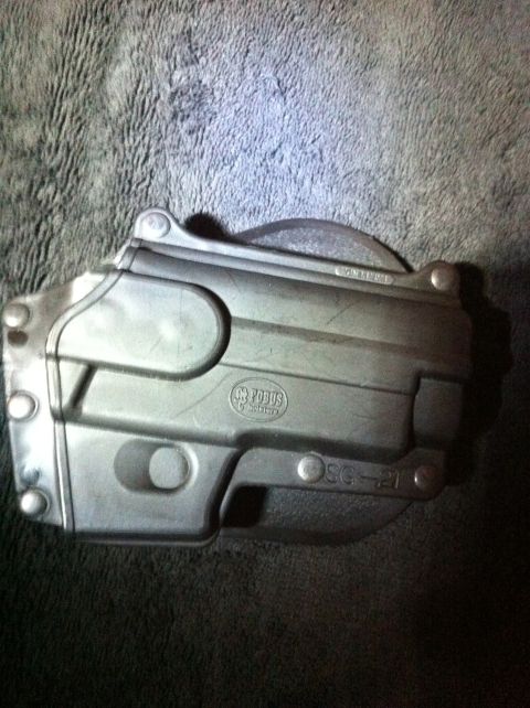 1984 BMW 3 Series - Close-up of a metal component marked with 'POBUS' and 'SG-21'.