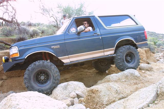 1994 Ford Bronco navigating rocky terrain