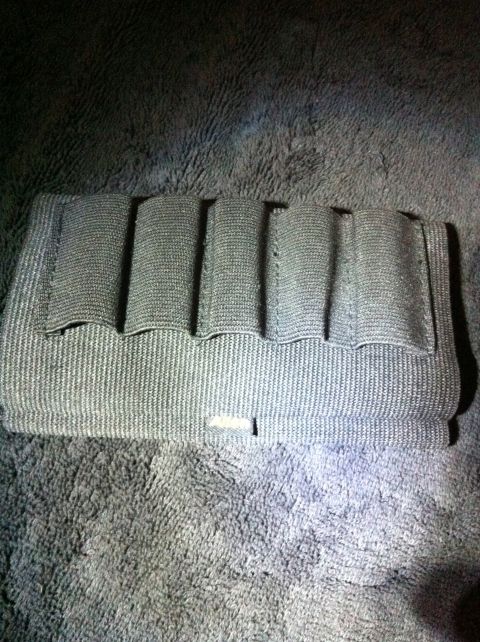 1984 BMW 3 Series - A fabric organizer with elastic straps is shown against a textured background.