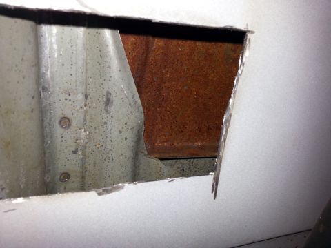 1992 Ford Bronco - inside of the passenger sail panel..look at all the rust..going to hit it with rust treatment. In hindsight it would have been a good idea…