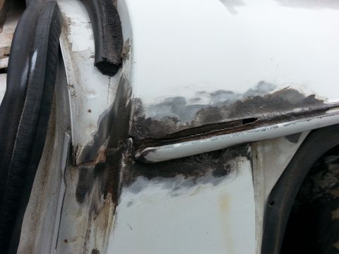 1992 Ford Bronco - passenger side drip rail cleaned up..the rust was a lot worse than I thought. you can see the huge gap.I'm going to weld up the back and th…