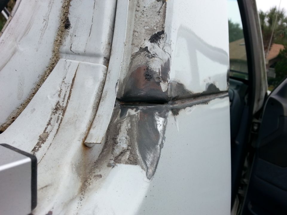 back of the sail panel, I ground out as much of the old seam sealer as I could..this was in pretty good shape.