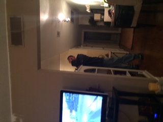 1995 Ford Probe - A person stands in a room with a television visible.