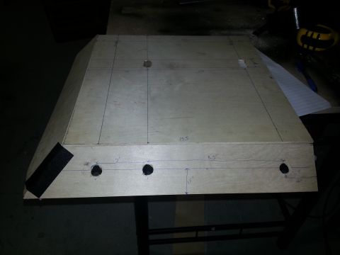 1994 Ford Bronco - A wooden structure, possibly a custom part, is marked with lines and holes for assembly.