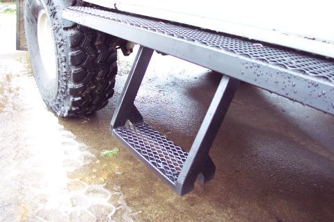 1996 Ford Bronco - Quick Detachable 'Granny' Step. About 16" inches from the ground & 11" to the step board. (1/3/2004)