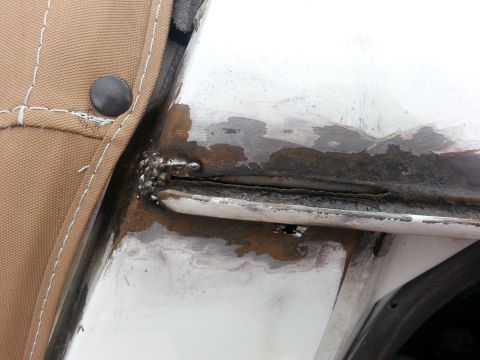 1992 Ford Bronco - started welding up the corner where the cracks were.