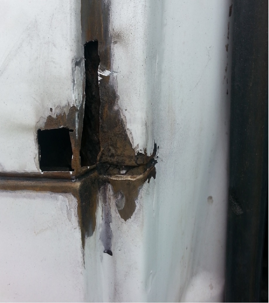 all of the rusted metal cut out from the b-pillar. In hind sight I probably should have cut a bigger section out and used a larger patch, but I didn't.