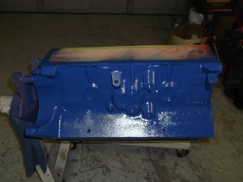 1967 Ford Mustang - A blue engine block is shown on a stand, with a taped-off section on its upper surface.