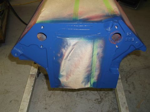 1967 Ford Mustang - A blue engine block is shown with masking tape applied, ready for further work. The Supermotors.net logo is visible in the lower right corn…