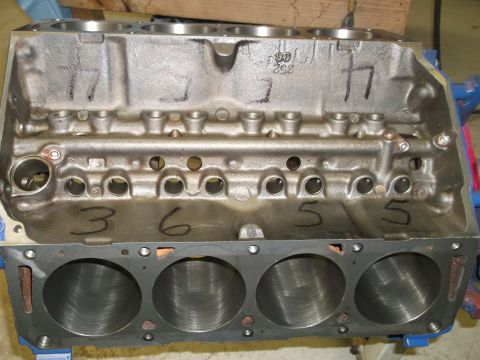 1967 Ford Mustang - Engine block with handwritten numbers on the casting.