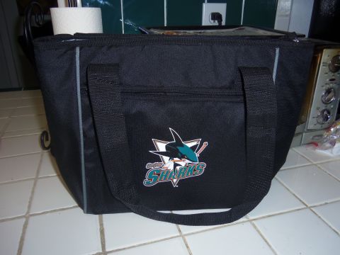 1968 Ford Bronco - A black cooler bag the San Jose Sharks logo is displayed on a kitchen counter.