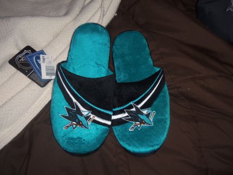 1968 Ford Bronco - San Jose Sharks logo slippers are shown with their original tags.