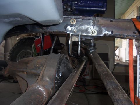 1968 Ford Bronco - Undercarriage view showing custom fabrication work on the vehicle's frame and suspension system.