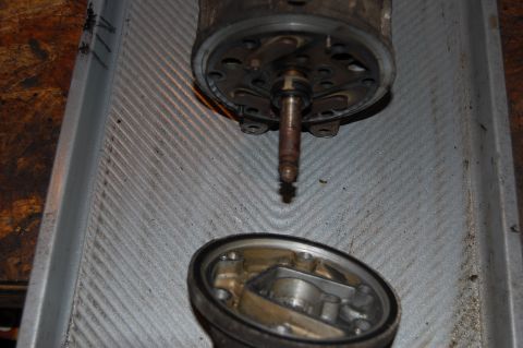 2006 Honda RANCHER - 6 bolts are removed and the front cover is pried off.