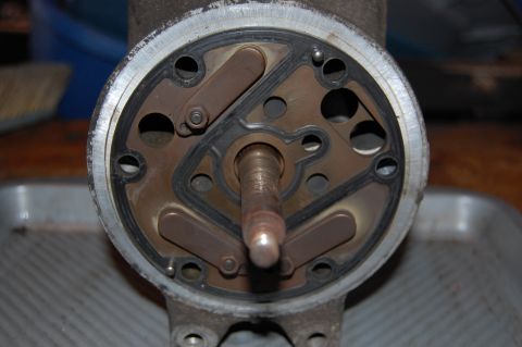 2006 Honda RANCHER - A close-up view of a compressor part, showing its internal mechanism and a central shaft.