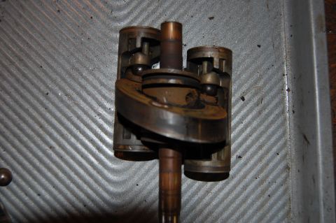 2006 Honda RANCHER - closeup of the piston and swash plate assembly with one piston removed. You can see the pads that ride on the swash plate.