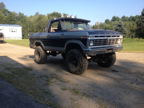 1970 Ford F-250 - This lifted 1978 Ford Bronco features a distinctive grille and dual-tone paint scheme.