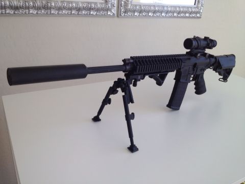2013 Ford Mustang - Assault rifle with suppressor, bipod, and scope.