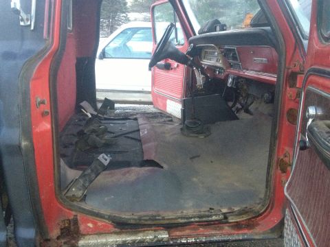 1970 Ford F-250 - Interior view of a 1970 Ford F-250 pickup truck, showing the driver's side floor and dashboard.