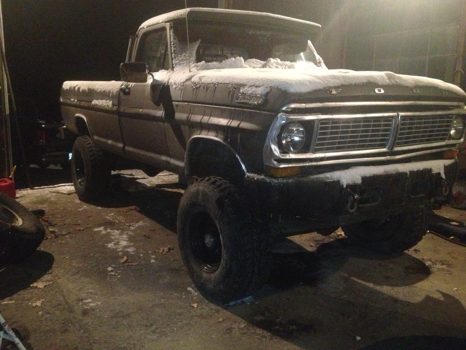 1970 Ford F-250 3q-front view with snow on hood and roof