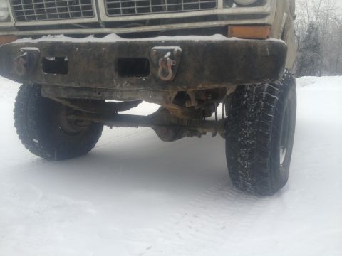 1970 Ford F-250 - Front view of a 1970 Ford F-250 with a heavy-duty bumper in snowy conditions.