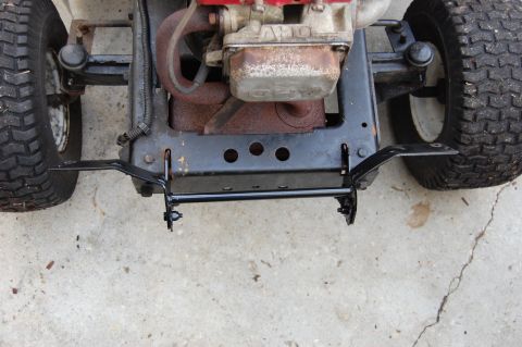 2006 Honda RANCHER - Front view of a lawn mower's engine and axle assembly, a Supermotors.net watermark.